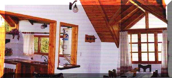Living, comedor y cocina de caba�as tipo 4